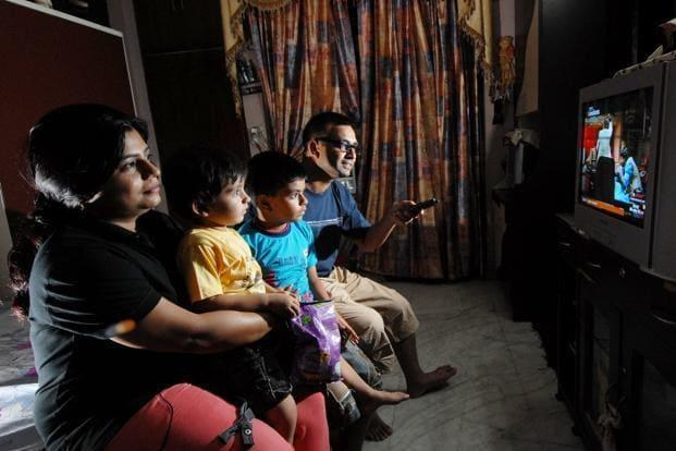 Indian family watching TV at home — streaming and OTT on stable fiber